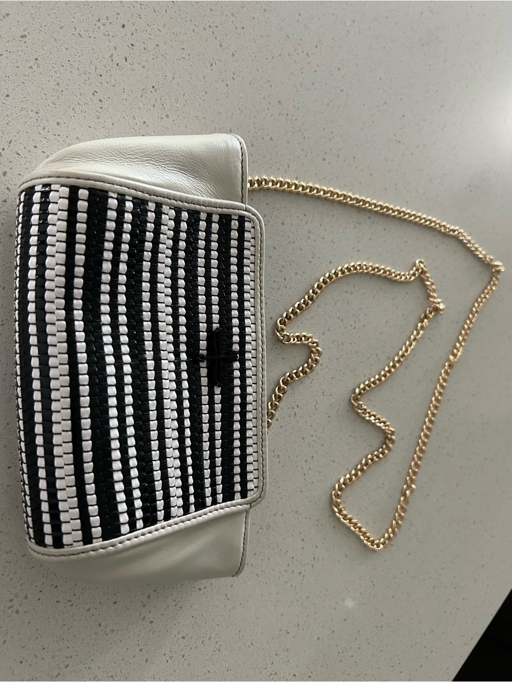 Pour La Victoire mini black‑and‑white mini crossbody bag w/ removable gold strap